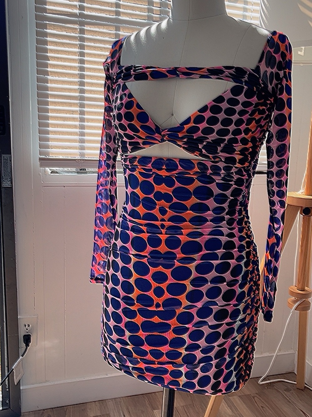 AFRM Navy and Orange Polka Dot Cutout Mini Dress